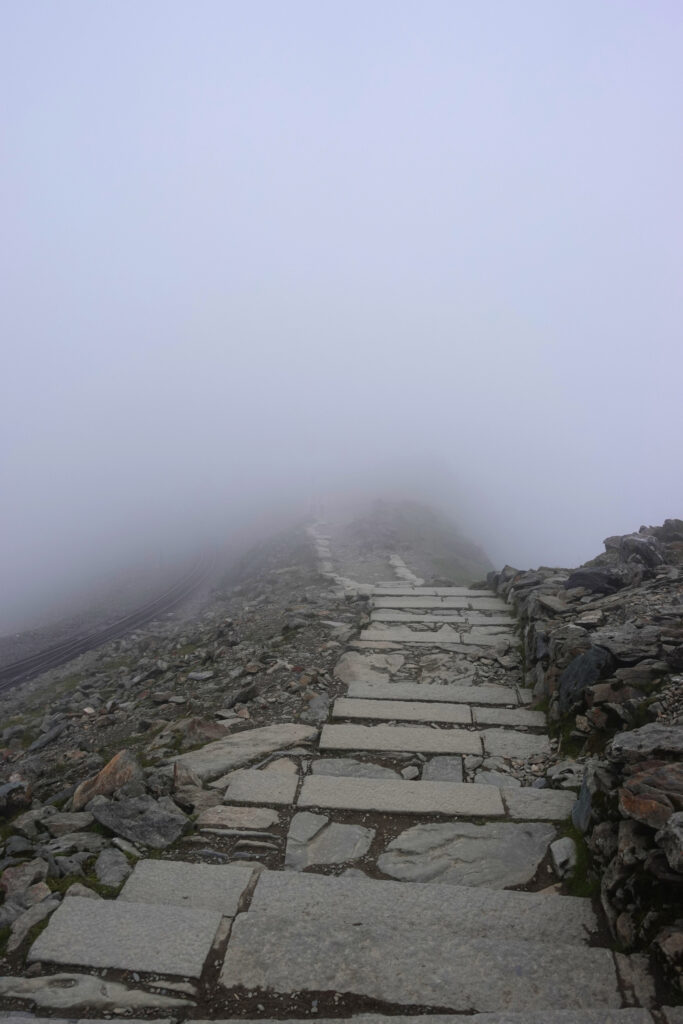 A stone trail in fog