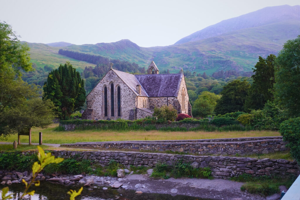 Church in front of hills in Beddgelert